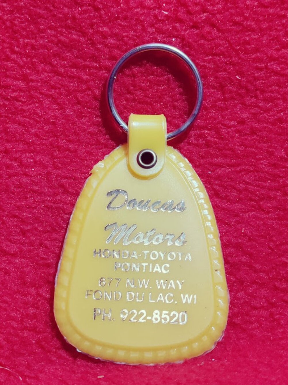 Vintage Daucus Motors Advertising Keychain
